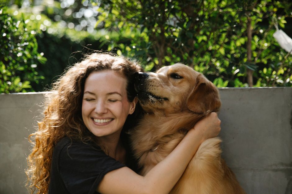 Val with a happy dog